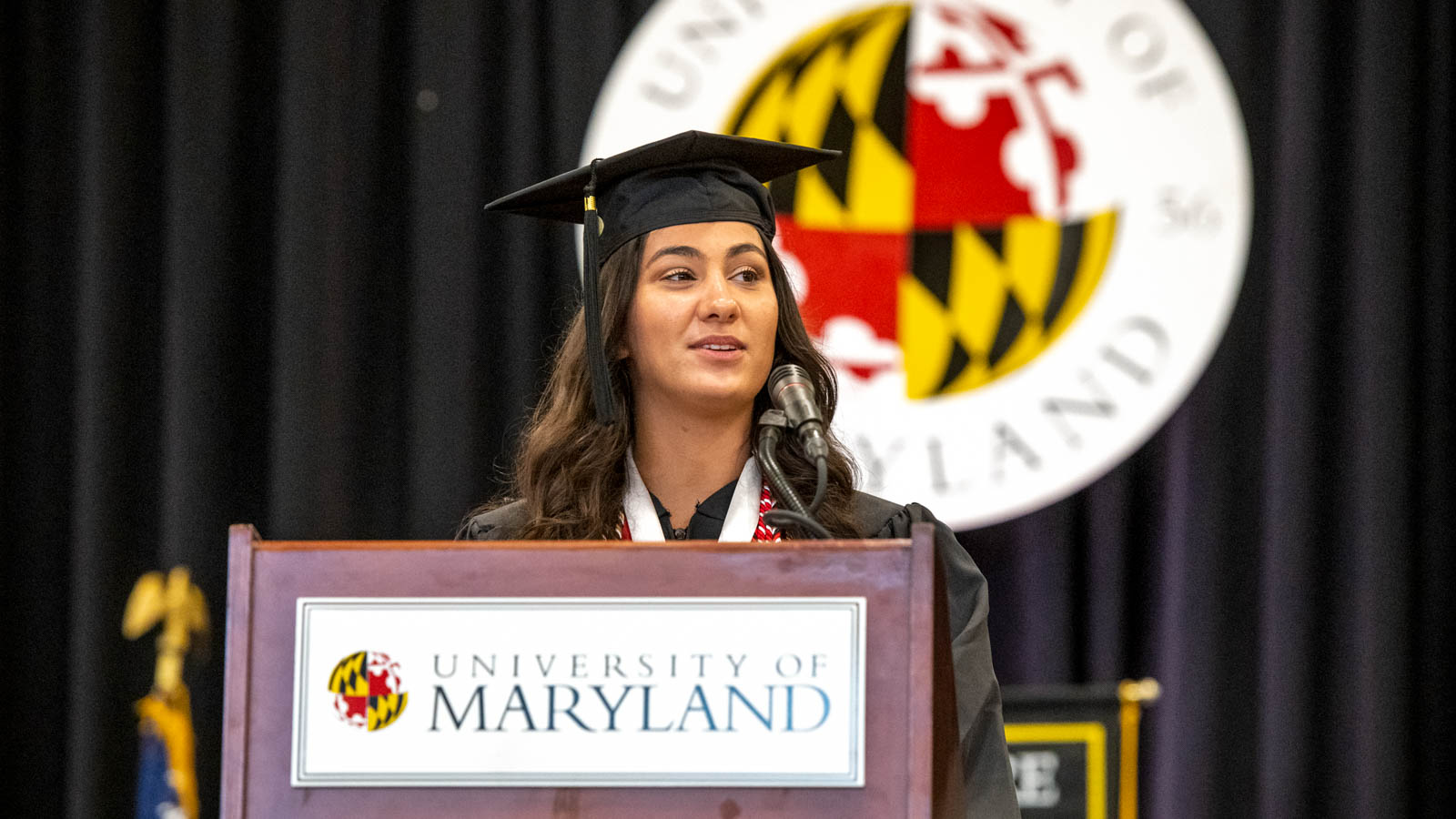 Graduate at podium giving speech